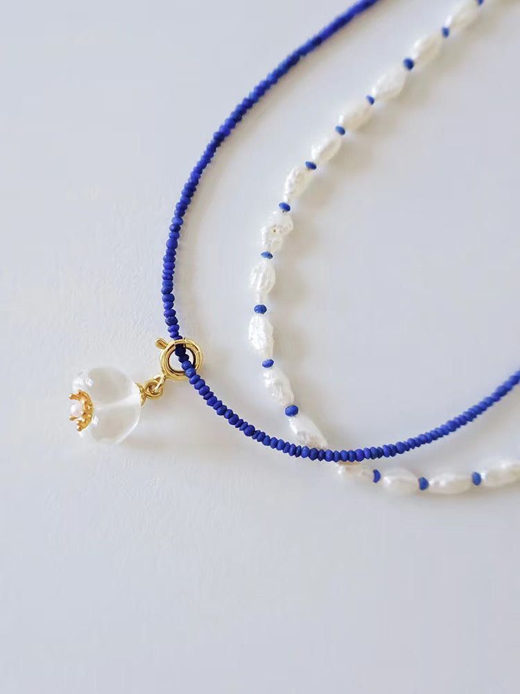 1.5mm lapiz lazuli necklace, flower shape clean quartz pendant. pearl necklace