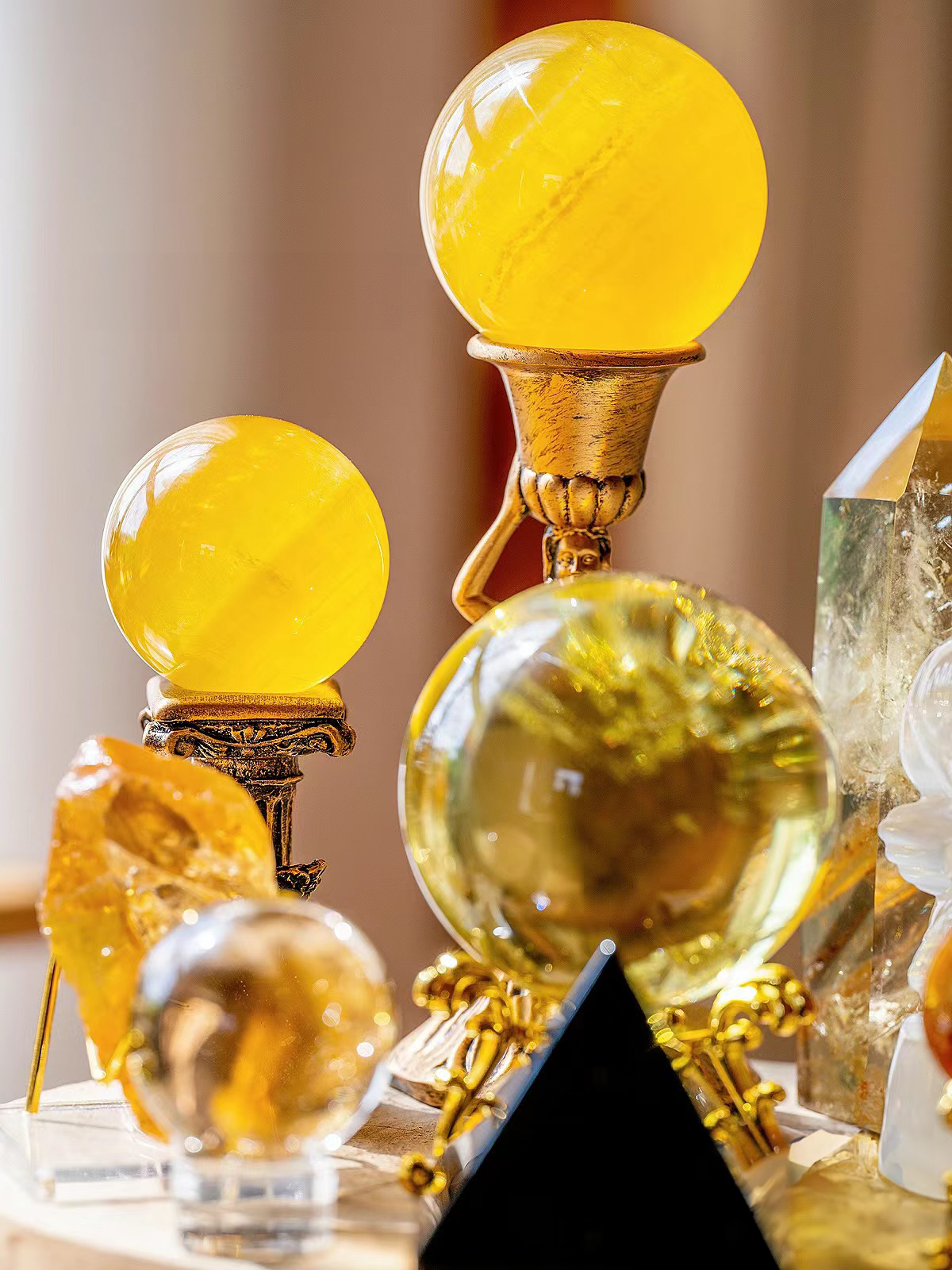 citrine, fluorite, clear quartz, obsidian, golden healer, crystal sphere, selenite, crystal homedeco