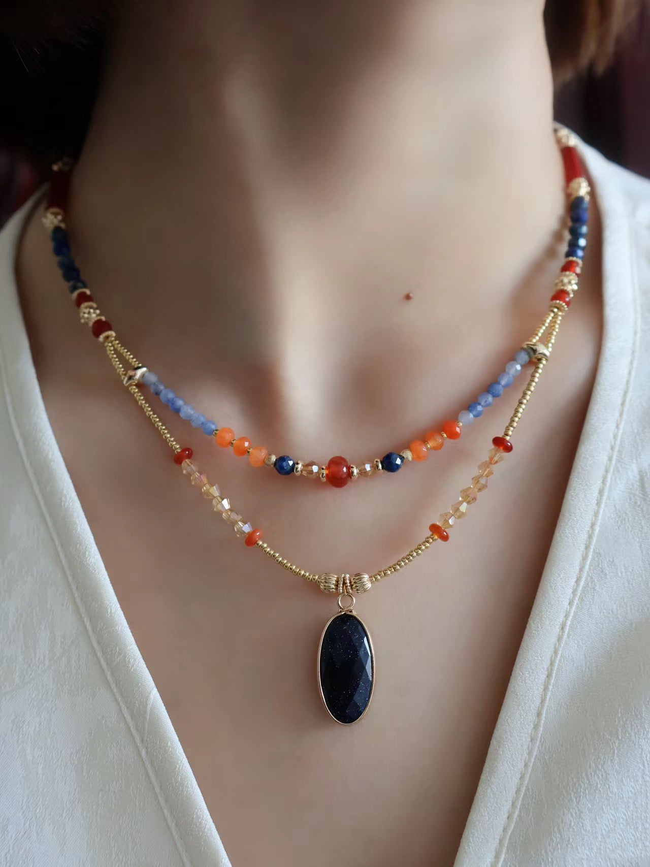 Lapis Lazuli, Blue sandstone, red agate, Kyanite, Gold vermeil on silver, Cat's eye, Bead model show